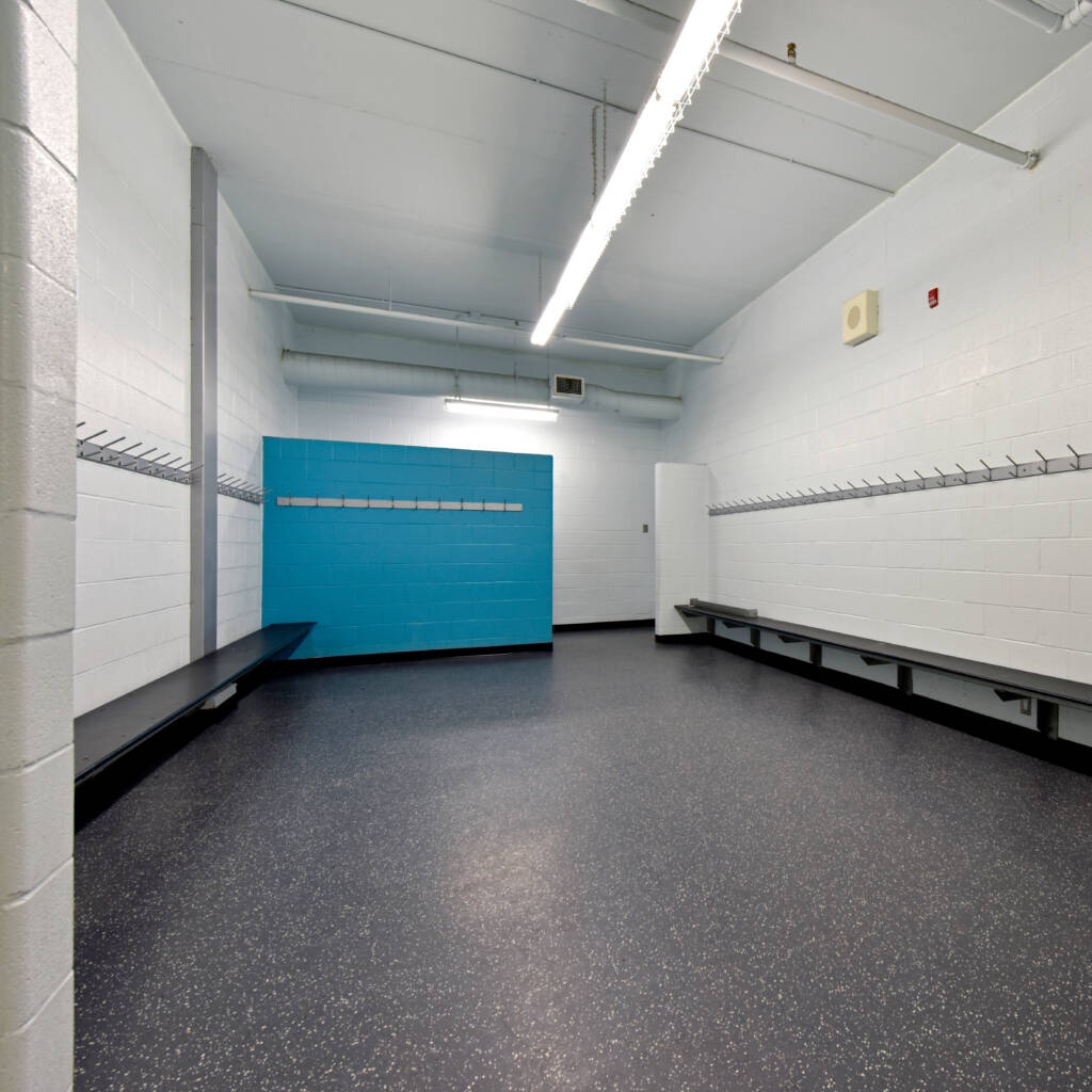 Players changing room with skate-resistant rubber flooring