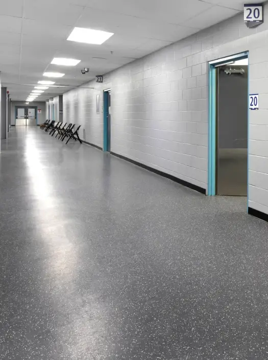 dbp_020-e_Square Skate-resistant rubber flooring in an arena ice rink corridor